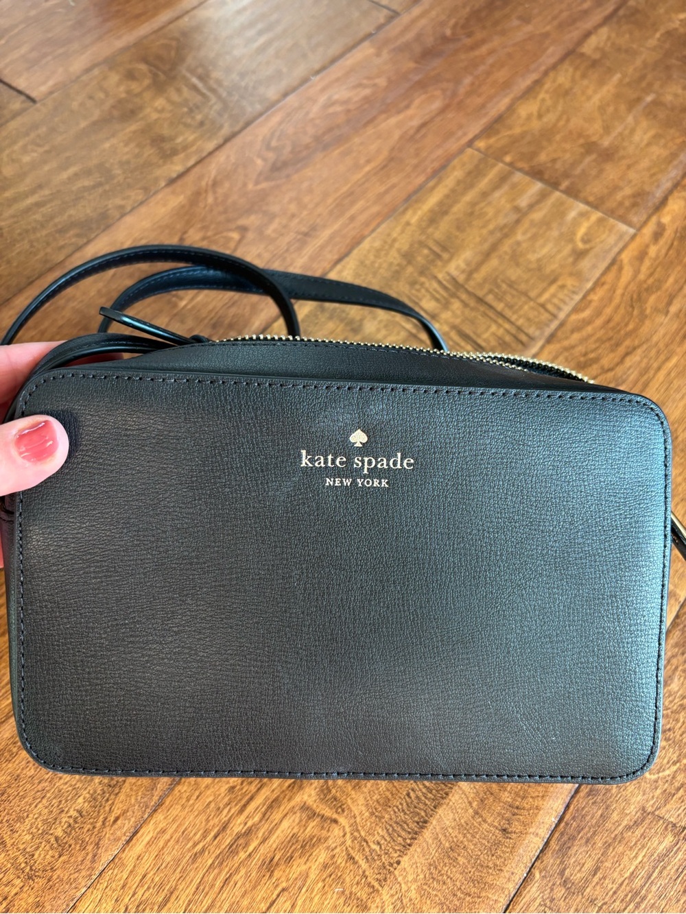 kate spade black leather crossbody with gold logo